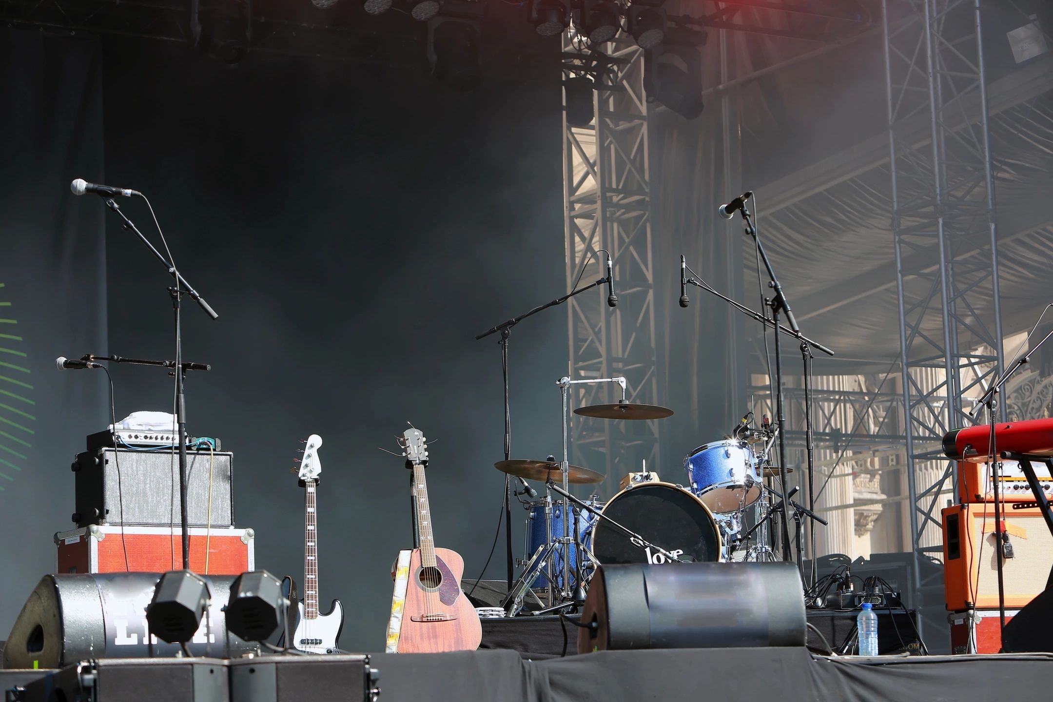 Band instruments set up on stage waiting for their musicians to come and play them.